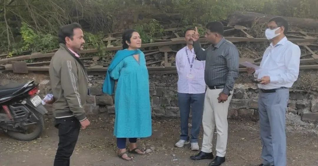 Administrators inspect cemetery work